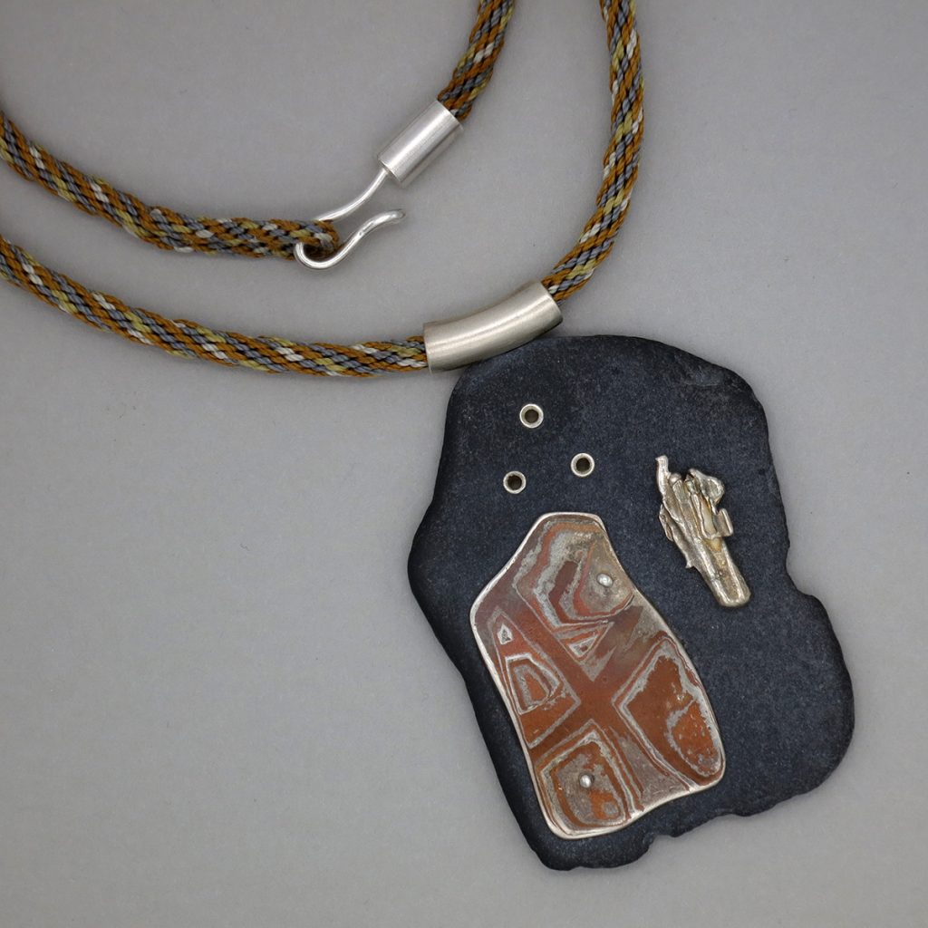 Slate pendant with mokume gane and silver casting